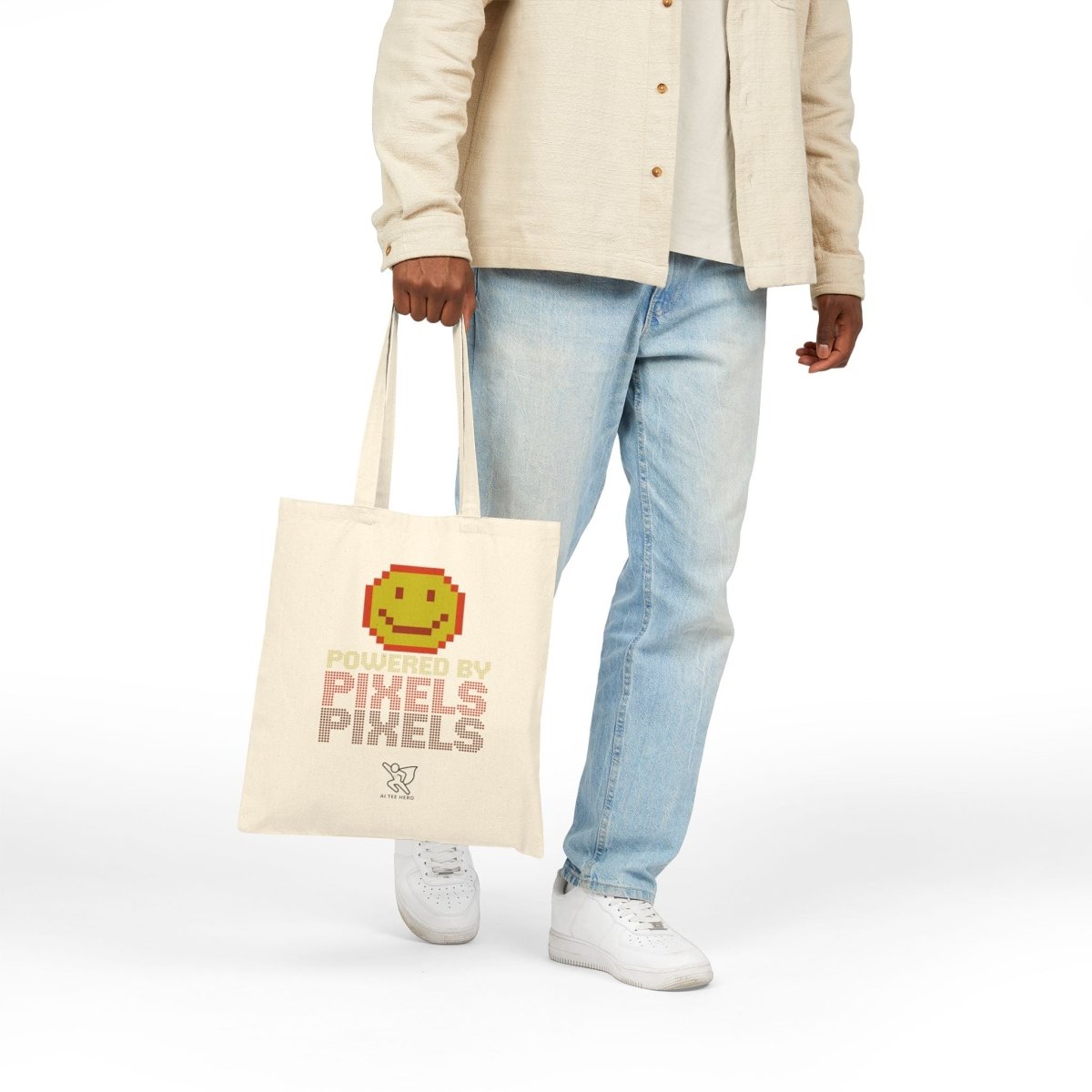 "Powered by Pixels" Pixelated Smile Cotton Canvas Tote Bag, Eco - Friendly Shopping Bag, Cute Gift for Gamers, Reusable Grocery Bag, Beach Bag - AI Tee Hero