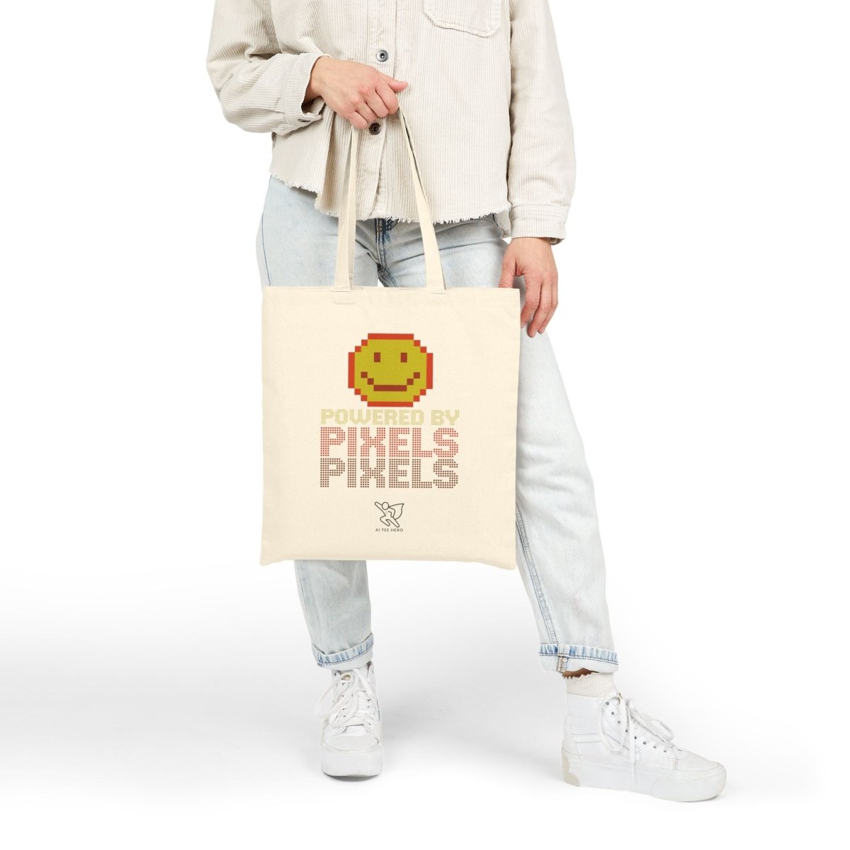 "Powered by Pixels" Pixelated Smile Cotton Canvas Tote Bag, Eco - Friendly Shopping Bag, Cute Gift for Gamers, Reusable Grocery Bag, Beach Bag - AI Tee Hero